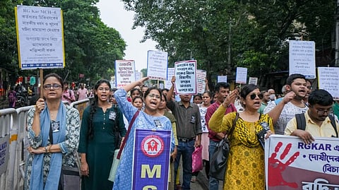 Activists of various organisations participate in a march to condemn the sexual assault and murder of a postgraduate trainee doctor at the RG Kar Medical College, in Kolkata, Tuesday, Aug. 13, 2024.