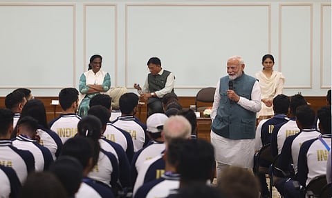 Modi shares a laugh with India's Olympians