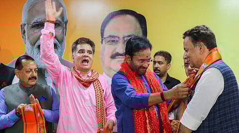 Union Minister G. Kishan Reddy felicitates former J&K minister Choudhary Zulfikar Ali as the latter joins BJP, in Jammu, Sunday, Aug. 18, 2024. Union MoS Jitendra Singh and J&K BJP President Ravinder Raina are also seen.