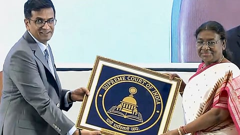 President Droupadi Murmu and Chief Justice of India (CJI) Justice DY Chandrachud release the Supreme Court of India's flag during the closing ceremony of 'National Conference of the District Judiciary', in New Delhi, Sunday, Sep. 1, 2024.