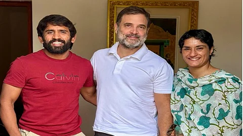 Leader of Opposition (LS) Rahul Gandhi with wrestlers Bajrang Punia and Vinesh Phogat