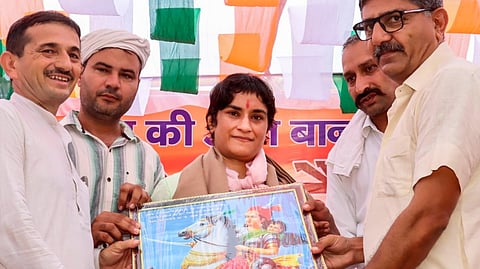 Congress candidate from Julana seat Vinesh Phogat being felicitated by Khap representatives during a programme, ahead of Haryana Assembly elections, at Julana in Jind district, Sunday, Sept. 8, 2024.