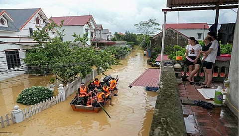 Flash flood sweeps away hamlet as Vietnam storm toll rises to 155 dead