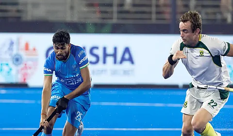 Raj Kumar (L)