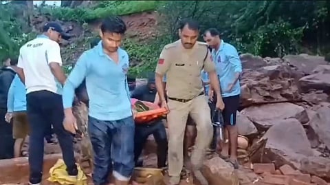 Rescue work underway after a house collapsed following heavy rainfall, in Datia district, Madhya Pradesh, Thursday, Sept. 12, 2024.