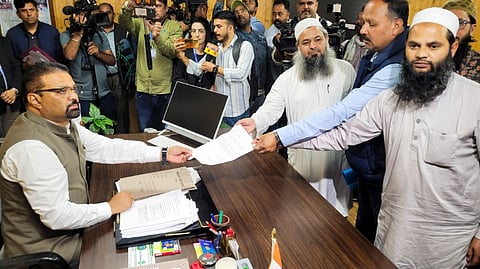 Representatives of Masjid committee submit a memorandum to the Shimla Municipal Corporation Commissioner Bhupender Kumar Attri over the alleged illegal structure in a mosque, at Sanjauli in Shimla, Thursday, Sept 12, 2024.
