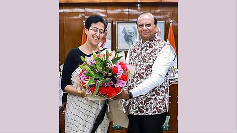 Delhi CM-designate Atishi and Lt Governor VK Saxena