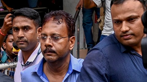CBI officials produce the former principal of RG Kar Medical College and Hospital Sandip Ghosh, arrested in connection with the alleged financial misconduct at the establishment, at a City Court in Kolkata, Tuesday, Sept. 3, 2024.
