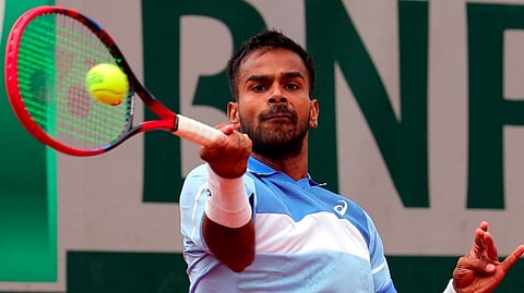 Sumit Nagal of India in action during his Men's Singles 1st round match against Karen Khachanov of Russia during the French Open Grand Slam tennis tournament at Roland Garros in Paris, France, 27 May 2024.