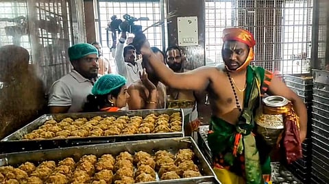 A priest performs the purification ritual 'Shanti Homam Panchagavya Prokshana' to undo the alleged desecrations that occurred at Sri Venkateswara Swamy Temple during YSRCP government, at Tirumala in Tirupati district, Andhra Pradesh, Monday, Sept. 23, 2024.