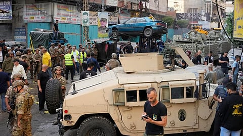 Hezbollah fires missile at Tel Aviv as Israel activates reserve troops in response to rising tension