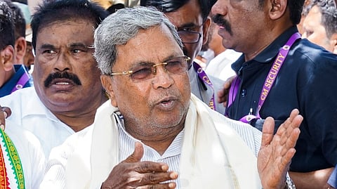 Karnataka Chief Minister Siddaramaiah speaks with the media outside his residence, in Mysuru, Karnataka, Saturday, Sept. 28, 2024.