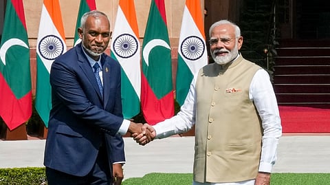 Prime Minister Narendra Modi shakes hands with Maldives President Mohamed Muizzu prior to a meeting at Hyderabad House, in New Delhi, Monday, Oct. 7, 2024.