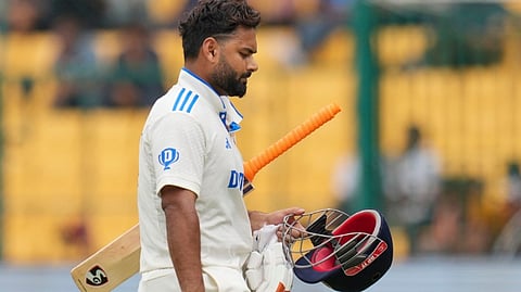 India's Rishabh Pant walks off the field after being dismissed by New Zealand's Matt Henry on the second day of the first test cricket match between India and New Zealand, at the M Chinnaswamy Stadium, in Bengaluru, Thursday, Oct. 17, 2024.