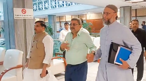 TMC's Kalyan Banerjee leaving the venue after sustaining injuries to hand when he smashed a glass bottle during a heated exchange with BJP's Abhijit Gangopadhyay at a meeting of Joint Parliamentary Committee on Waqf (Amendment) Bill, in New Delhi, Tuesday, Oct. 22, 2024.