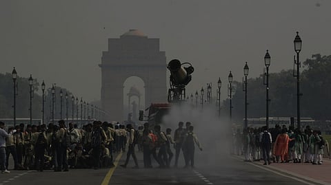 An anti-smog gun being used at the Kartavya Path to curb air pollution, near the India Gate, in New Delhi.