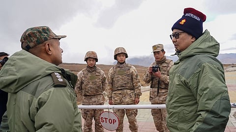 Rijiju interacts with Chinese soldiers near Tawang