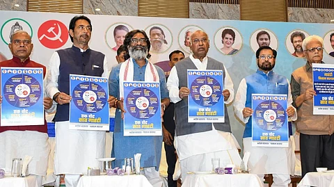 Congress President Mallikarjun Kharge with Jharkhand CM Hemant Soren and others during the release of Jharkhand INDIA block manifesto ahead of Jharkhand Assembly election, in Ranchi, Tuesday, Nov. 5, 2024.