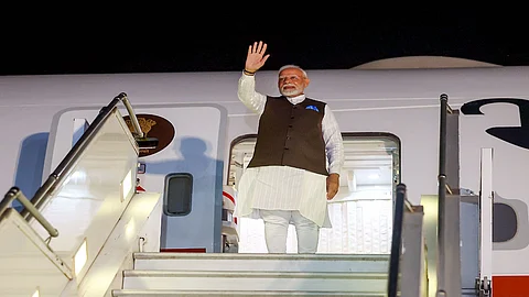 PM Narendra Modi arrives in Nigeria