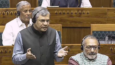 Union Minister Ashwini Vaishnaw speaks in the Lok Sabha during the Winter session of Parliament, in New Delhi, Wednesday, Nov. 27, 2024.