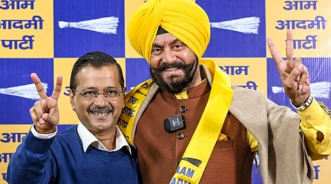 AAP national convener Arvind Kejriwal with Padma Shri awardee social worker Jitender Singh Shunty as the latter joins AAP, in New Delhi, Thursday, Dec. 5, 2024.