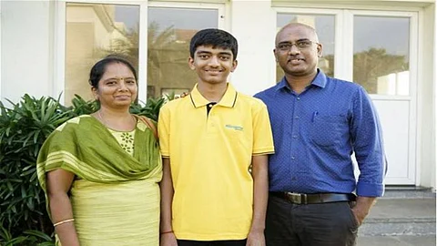 D Gukesh with his parents