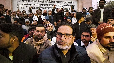 Jan Suraaj chief Prashant Kishor with others during an indefinite hunger strike demanding the cancellation of the 70th Integrated Combined Competitive (Preliminary) Examination (CCE), 2024, conducted by the BPSC, over allegations of question paper leak, near Mahatma Gandhi statue in Patna, Thursday, Jan. 2, 2025.