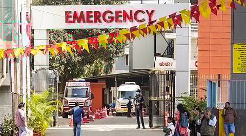 People outside the Emergency of Bangalore Baptist Hospital where two cases of the Human Metapneumovirus (HMPV) were detected, in Bengaluru, Monday, Jan. 6, 2025.