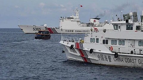 China is pushing Philippines 'to wall' with aggression in South China Sea, Manila says