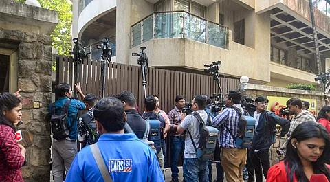 Media persons outside Bollywood actor Saif Ali Khan's residence after an intruder attacked him with a knife, at Bandra, in Mumbai, Thursday, Jan. 16, 2025.