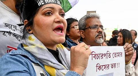 People stage a protest near the Sealdah court during the pronouncement of sentence in the case of alleged rape and murder of an on-duty doctor at the R G Kar Medical College and Hospital after conviction of accused Sanjay Roy, in Kolkata, Monday, Jan. 20, 2025.