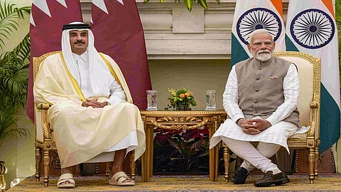 PM Narendra Modi and Amir of Qatar Sheikh Tamim Bin Hamad Al-Thani