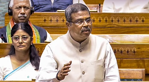 Union Minister Dharmendra Pradhan speaks in the Lok Sabha during the Budget session of Parliament, in New Delhi, Monday, March 10, 2025.
