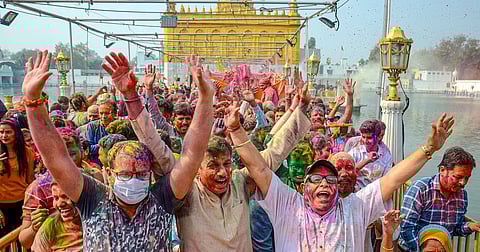 Holi, the festival of colours, was celebrated in Haryana, Punjab with great fervour on Friday as children threw balloons filled with colourful water, people smeared 'gulal' on each others' faces and distributed sweets to friends and relatives.
