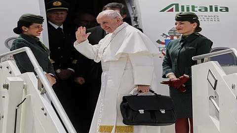 During his first foreign trip in 2013, Pope Francis made headlines when he carried his own black leather briefcase
