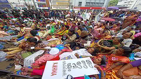 The ASHA workers protesting outside the Secretariat