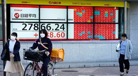 Asian markets and US futures tumbled Thursday following US President Donald Trump's announcement of big increases in tariffs on imports of goods from around the world.