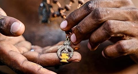 TDB begins distribution of gold lockets of Lord Ayyappa in Sabarimala