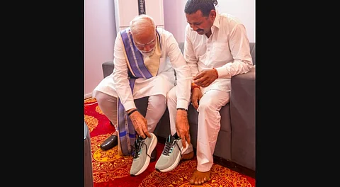 Prime Minister Narendra Modi meets Rampal Kashyap from Kaithal.