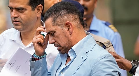 Businessman Robert Vadra arrives at the Enforcement Directorate's office for his questioning on the second straight day, in a 2008 Haryana land deal linked money laundering case, in New Delhi, Wednesday, April 16, 2025.