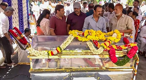 People pay their last respects to the mortal remains of former Karnataka Director General of Police Om Prakash, in Bengaluru, Monday, April 21, 2025.