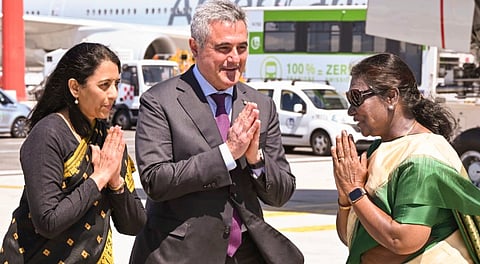 President Droupadi Murmu being greeted upon her arrival at the airport to attend the funeral mass of Pope Francis, in Rome, Italy.