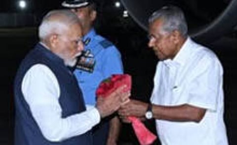 Kerala CM Pinarayi Vijayan receives PM Modi in Thiruvananthapuram airport.