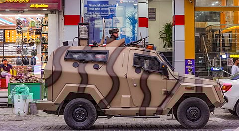 Security personnel patrol a street in an armoured vehicle amid high alert, in the aftermath of the Pahalgam terror attack, in Srinagar, Thursday, May 1, 2025.