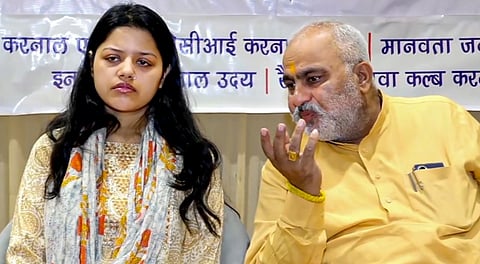 Pahalgam terror attack victim Lt Vinay Narwal's wife Himanshi with BJP MLA Jagmohan Anand during a blood donation camp organised on her husband's birth anniversary, in Karnal, Thursday, May 1, 2025.