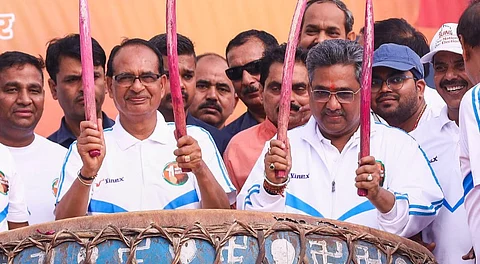 Union Minister Shivraj Singh Chouhan and other leaders during a run for the 'one nation one election', in Noida, Sunday, May 4, 2025.