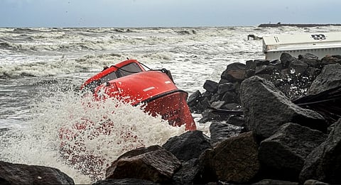 Containers from the Liberian cargo ship MSC ELSA 3 that sank off the Kochi coast drifted ashore, in Kollam, Kerala, Monday, May 26, 2025.