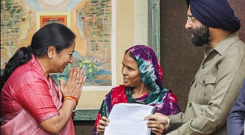 Delhi Chief Minister Rekha Gupta with Minister Manjinder Singh Sirsa presents job letters to the family members of the victims of 1984 anti-Sikh riots, at Delhi Secretariat, Tuesday, May 27, 2025.