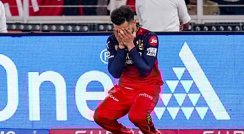 Royal Challengers Bengaluru's Virat Kohli reacts after winning the Indian Premier League (IPL) 2025 T20 final cricket match between Royal Challengers Bengaluru and Punjab Kings, at the Narendra Modi Stadium, in Ahmedabad, Tuesday, June 3, 2025.