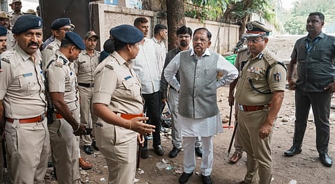 Karnataka Home Minister G Parameshwara during an inspection after the stampede near the Chinnaswamy stadium that claimed 11 lives, in Bengaluru, Thursday, June 5, 2025.